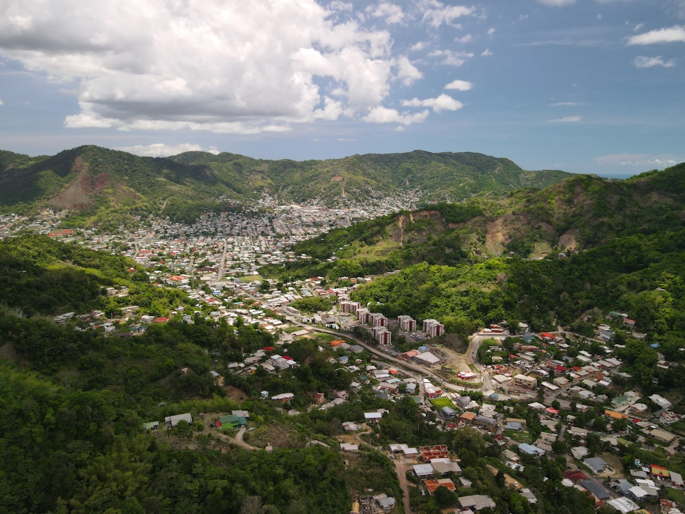 a view of a small town in the mountains