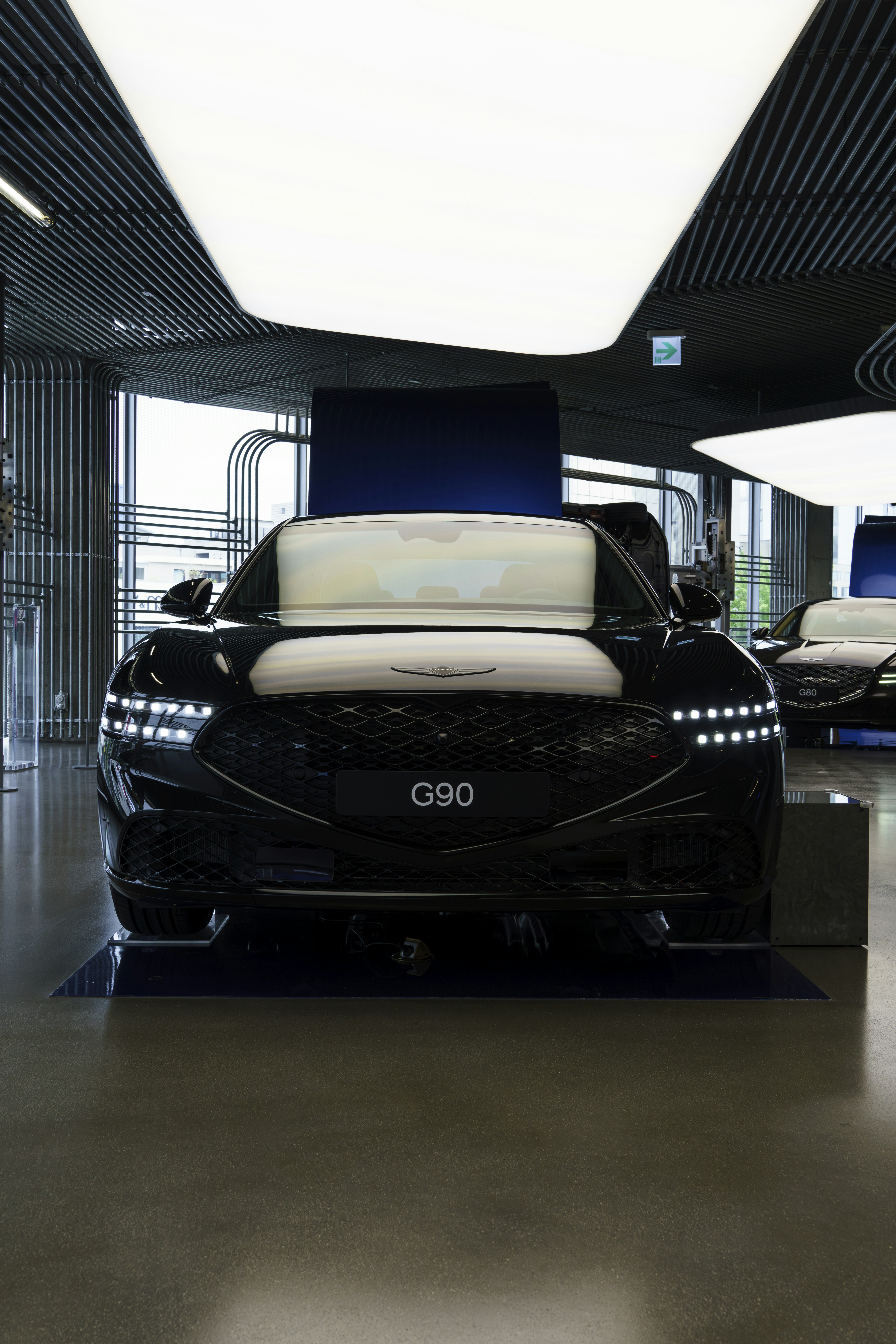 a group of cars parked in a garage