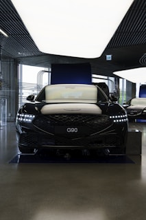 a group of cars parked in a garage