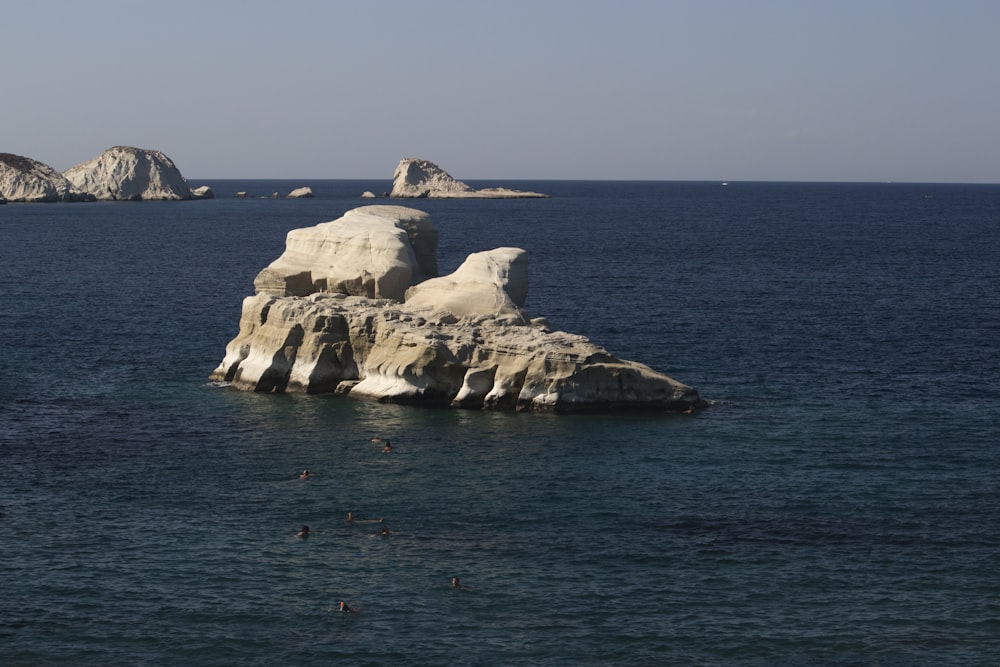 a body of water that has some rocks in it