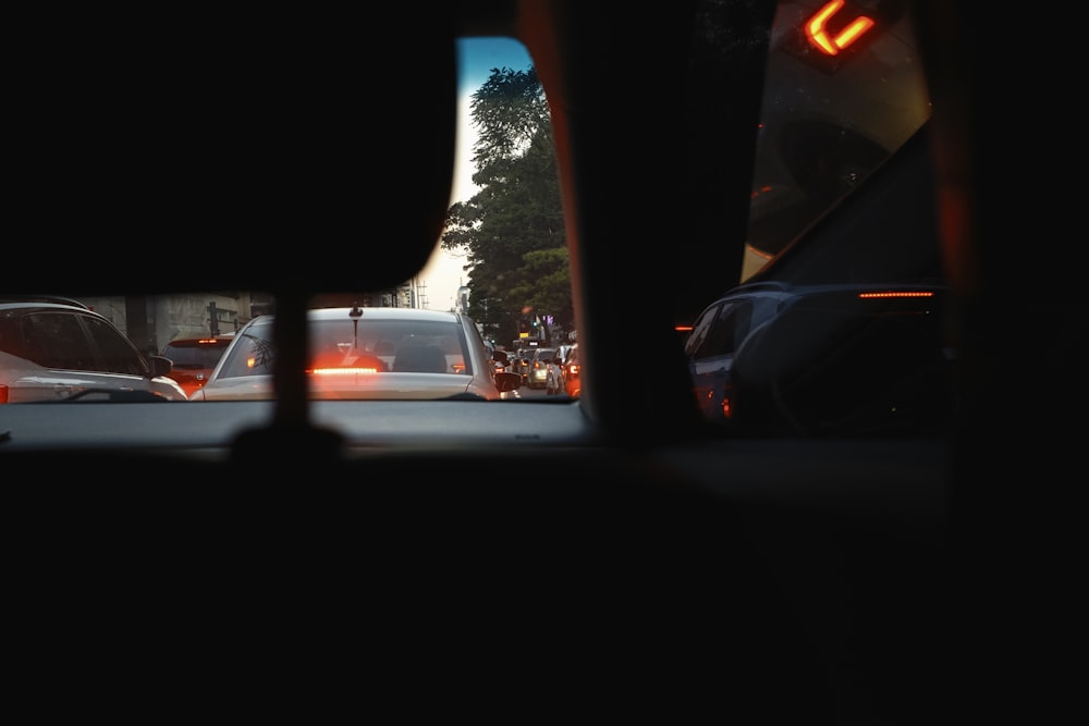 a view of a city street from inside a vehicle