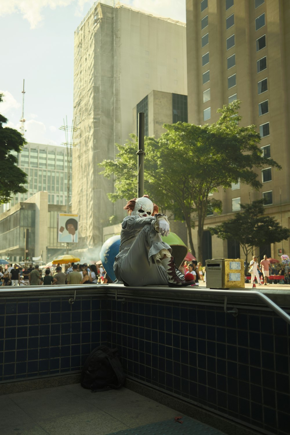 a person riding a horse on a city street