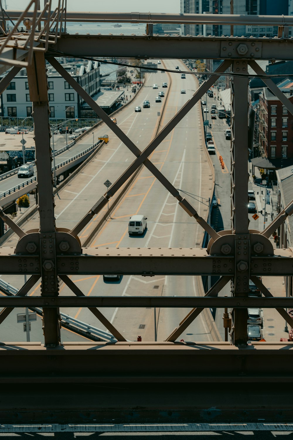 a view of a city street from a bridge