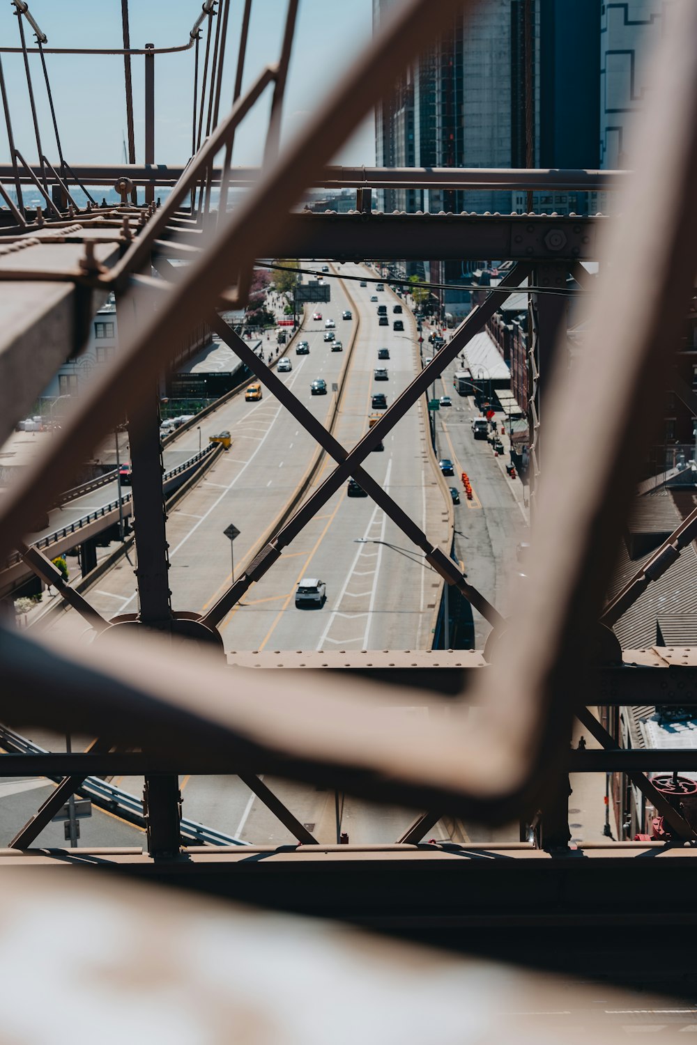 a view of a city street from a bridge