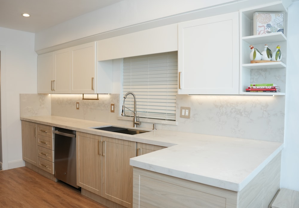 a kitchen with a sink and a dishwasher