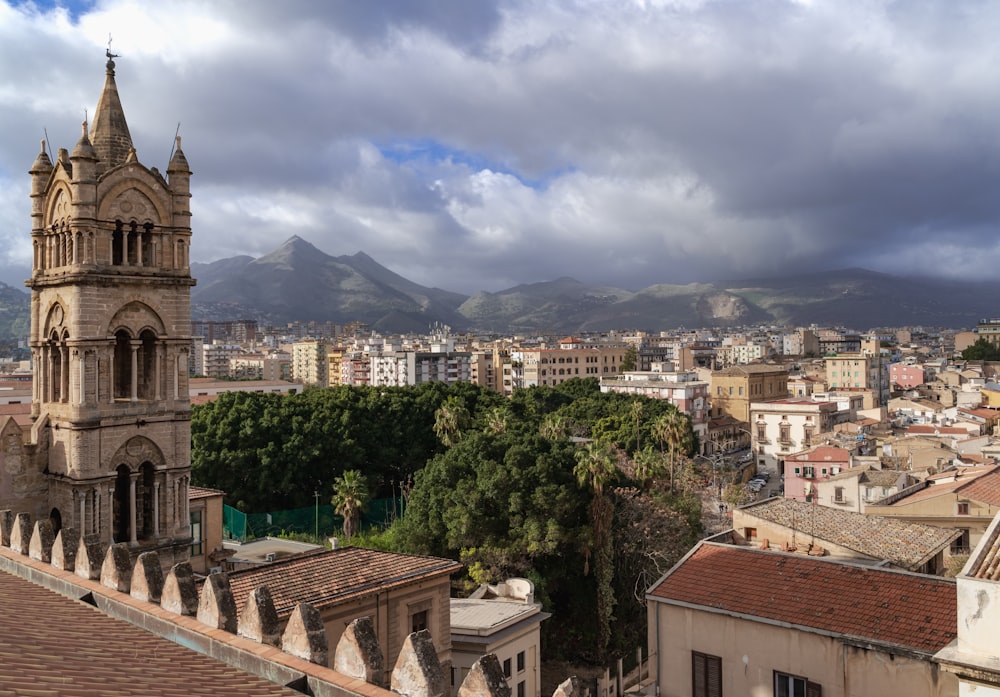 a view of a city with mountains in the background