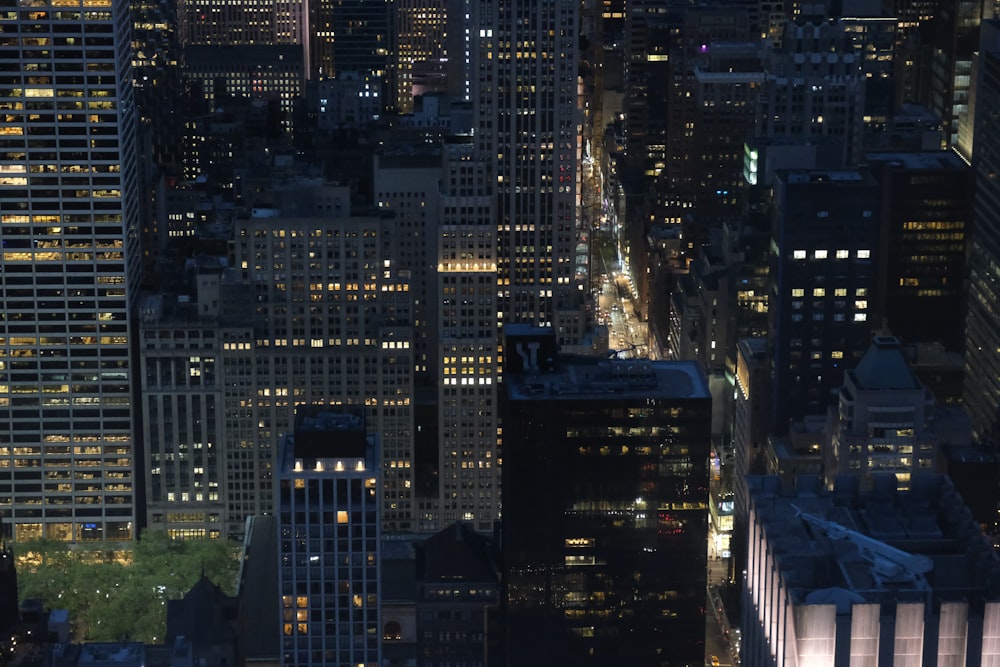 a view of a city at night from the top of a building