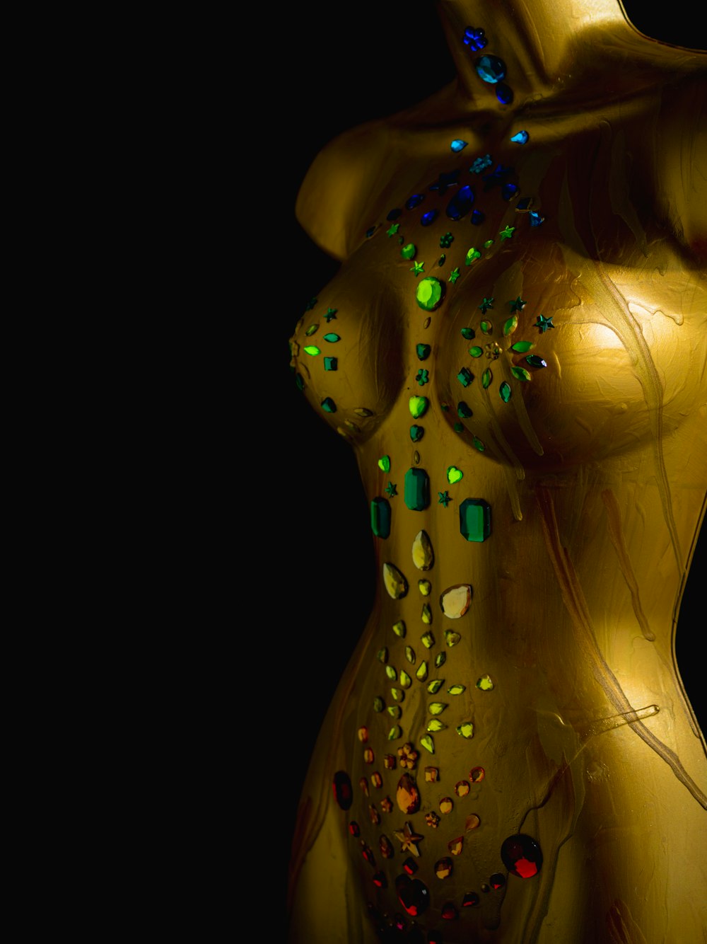 a woman's body is covered in colorful lights