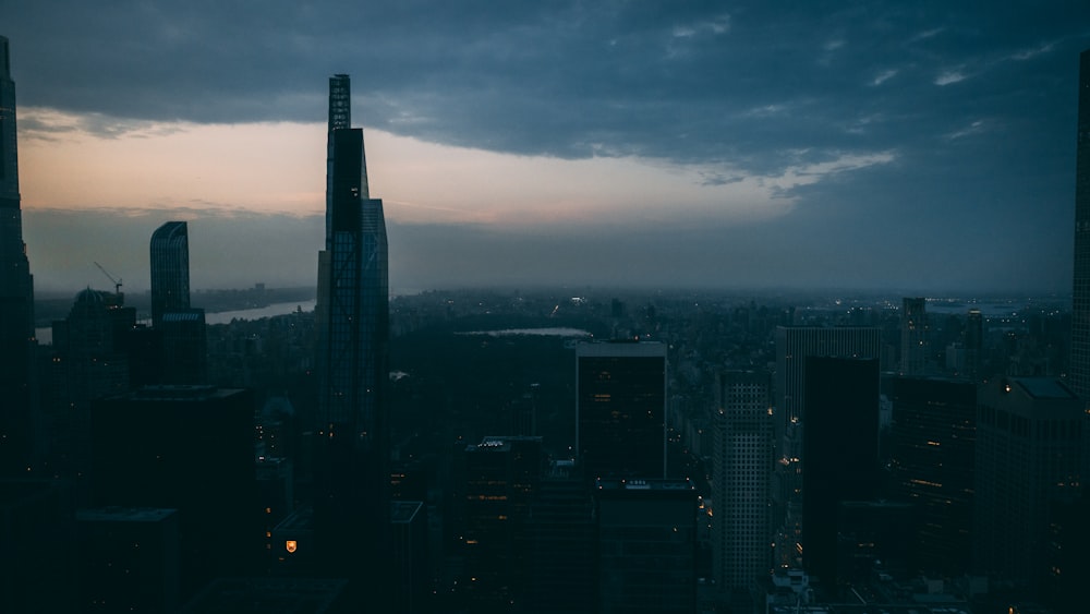 a view of a city at night from the top of a building