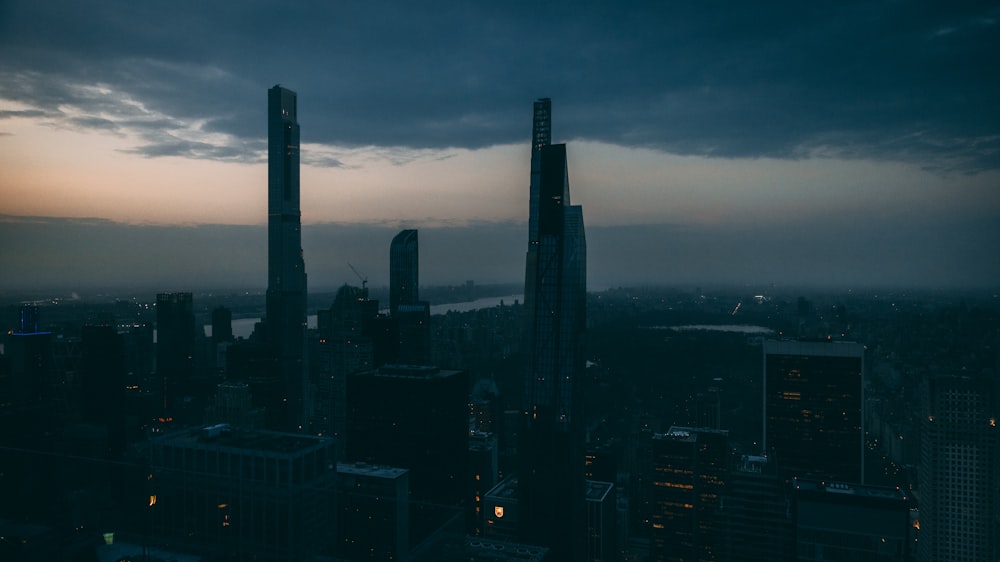 a view of a city at night from the top of a building