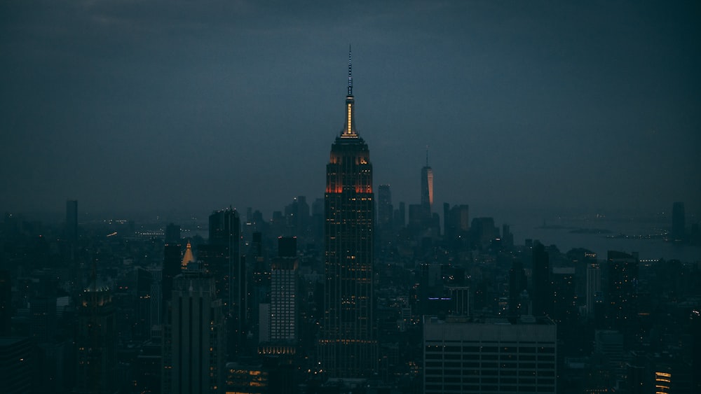 a view of a city at night from the top of a building