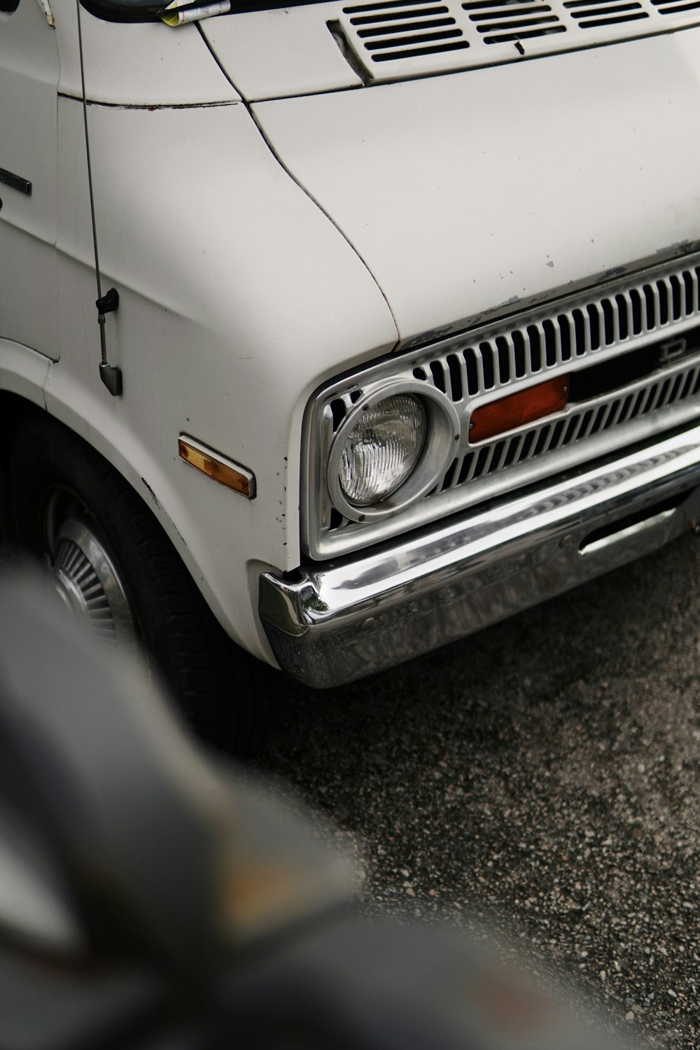 a white truck parked in a parking lot