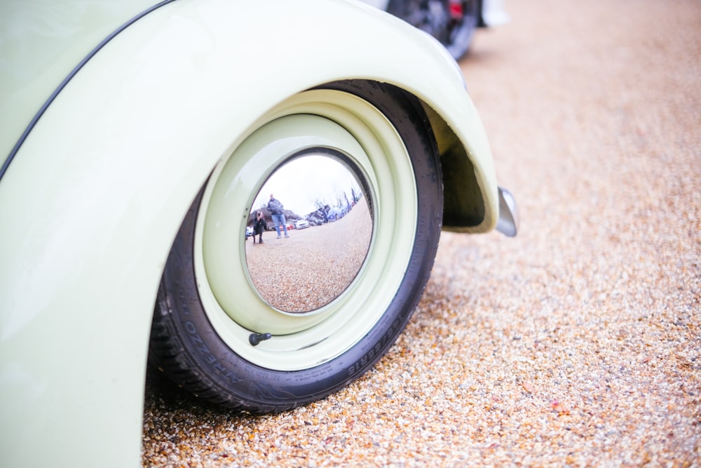 a close up of a car's rear tire