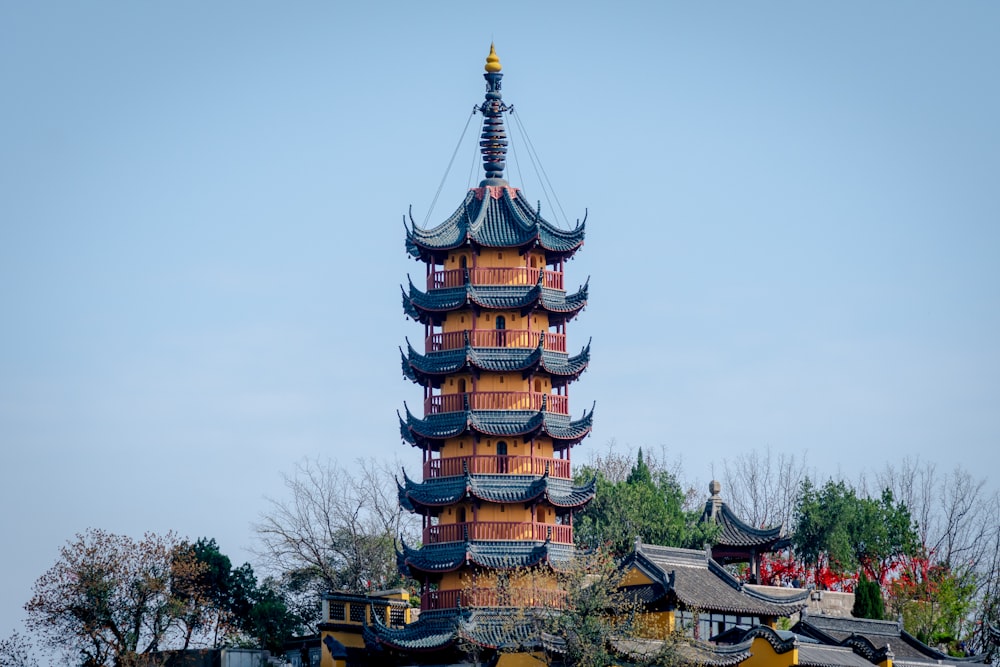 a tall tower with a clock on the top of it