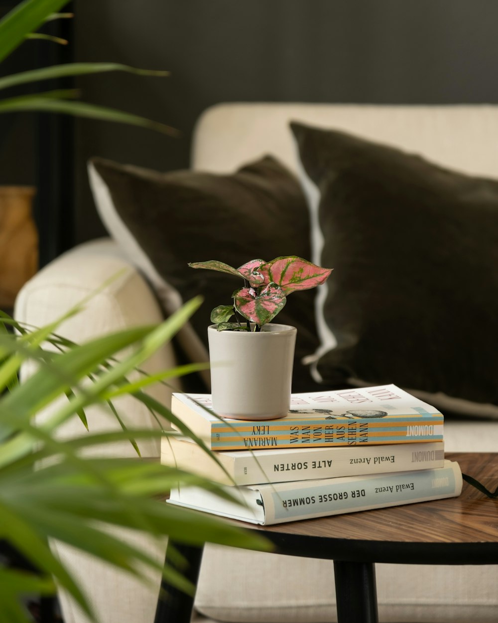 a stack of books sitting on top of a table