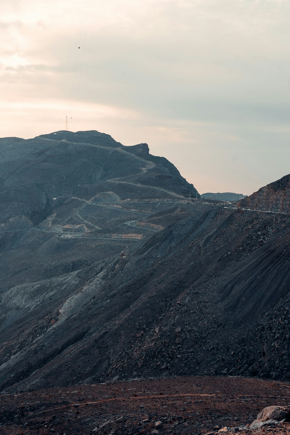 a mountain with a hill in the background