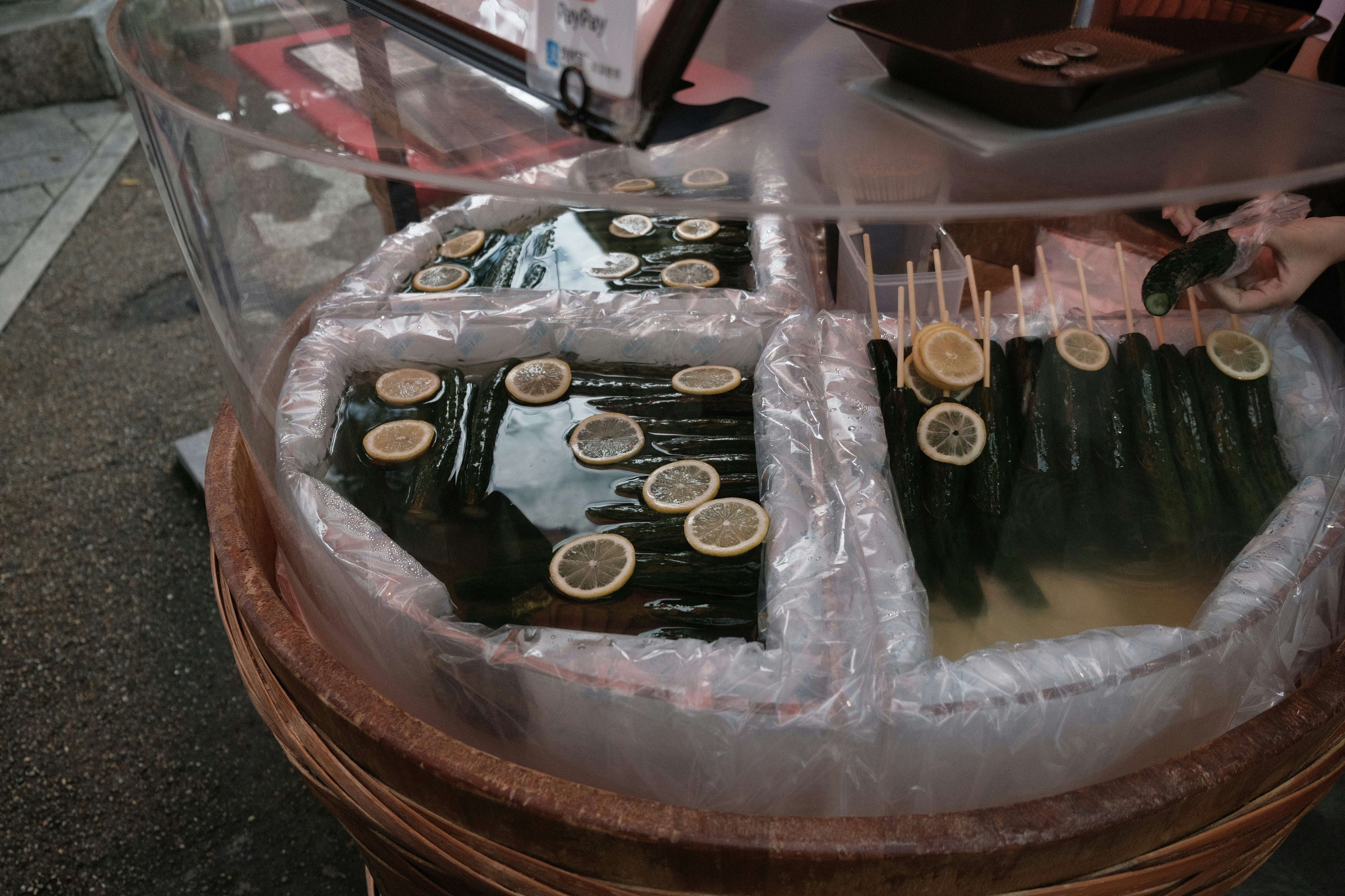 Display of various types of prop money on a shelf in a store