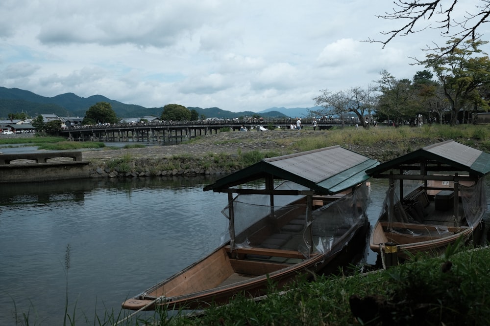 a couple of boats that are sitting in the water