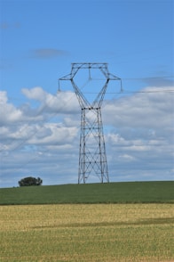 a power line in the middle of a field