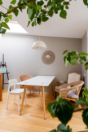 a white table and chairs in a room