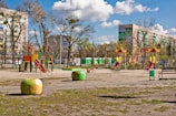 a park with a playground and play equipment