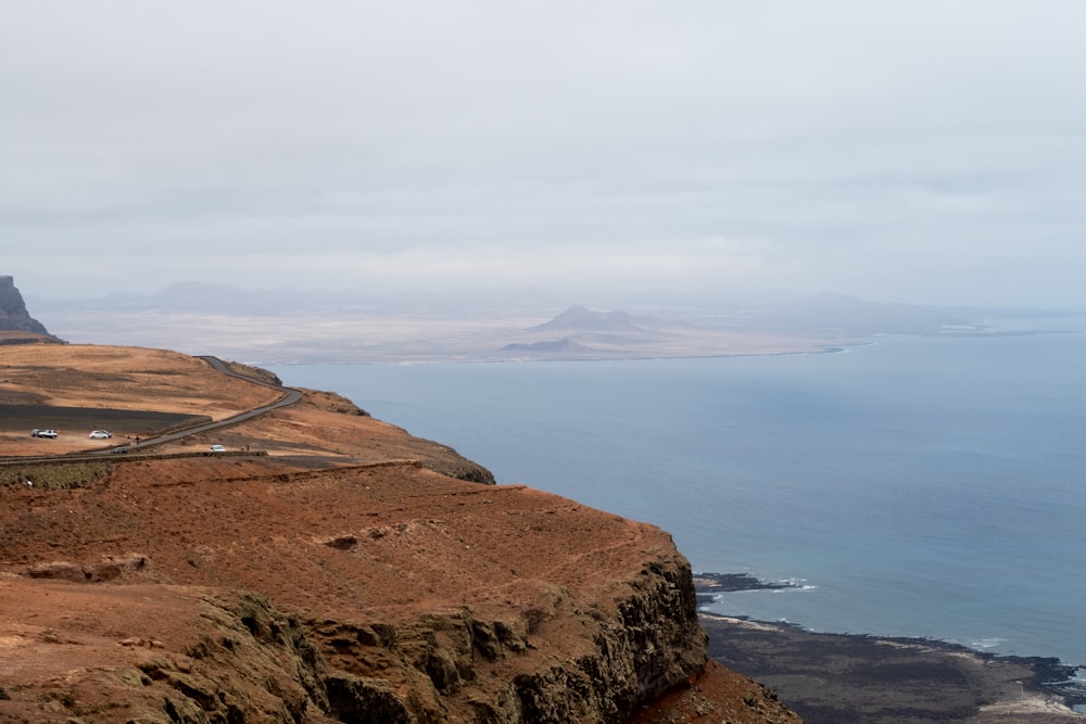 a scenic view of the ocean from a cliff