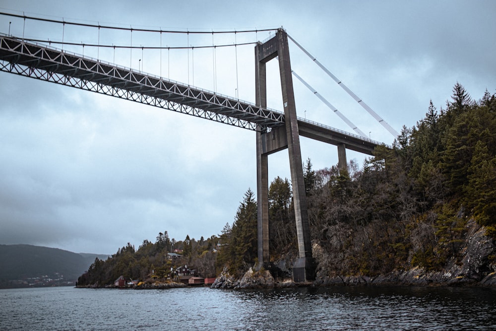 a suspension bridge over a body of water