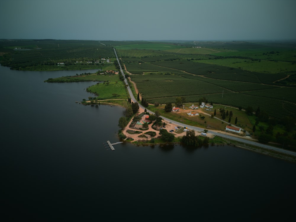 an aerial view of an island in the middle of a lake