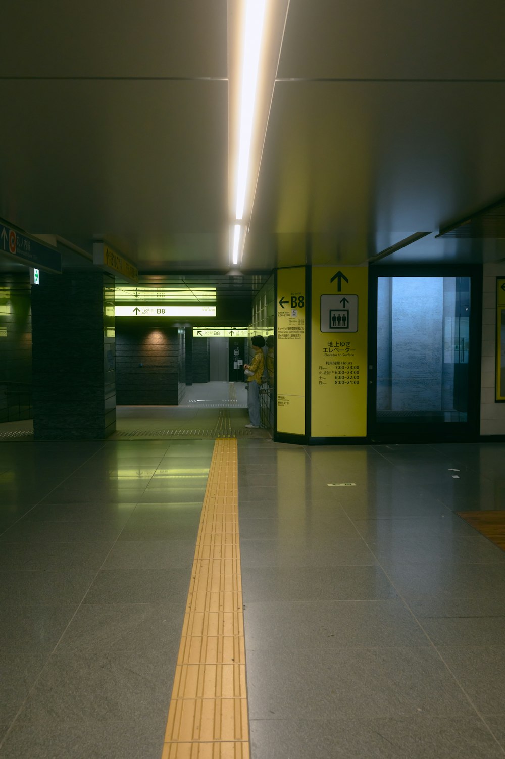 a long yellow line in the middle of a building