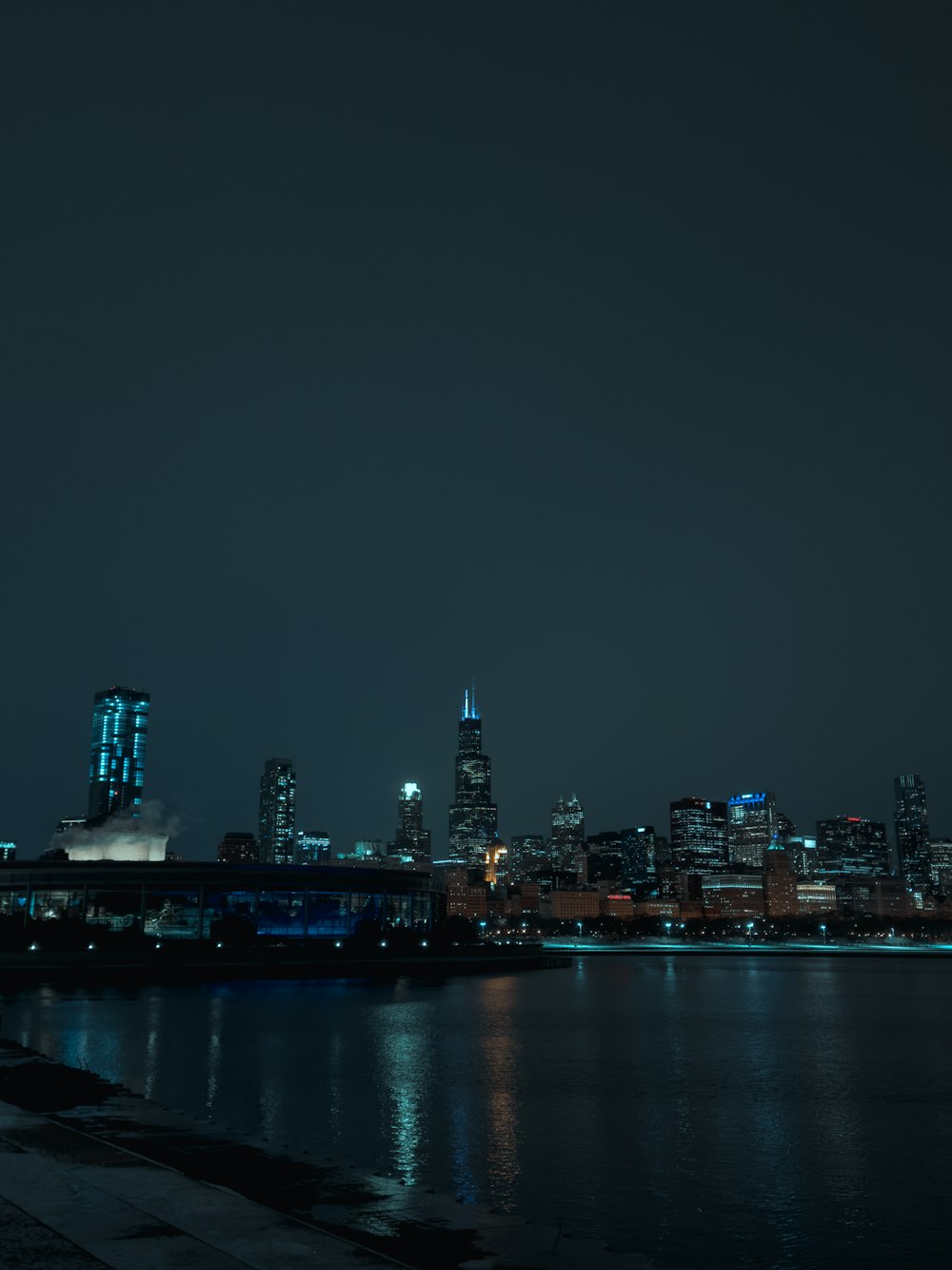 a view of a city at night from across the water