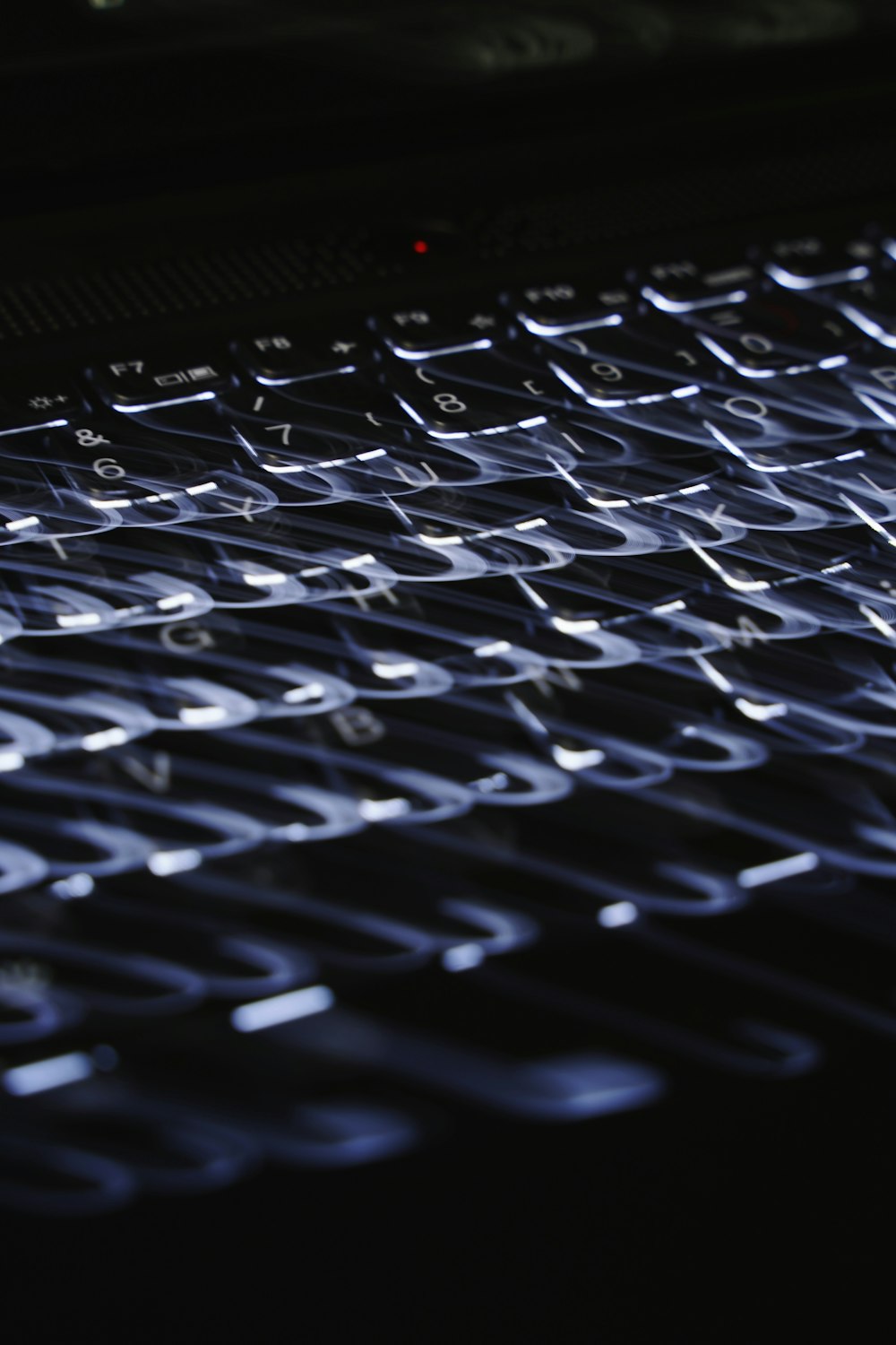 a close up of a computer keyboard on a table