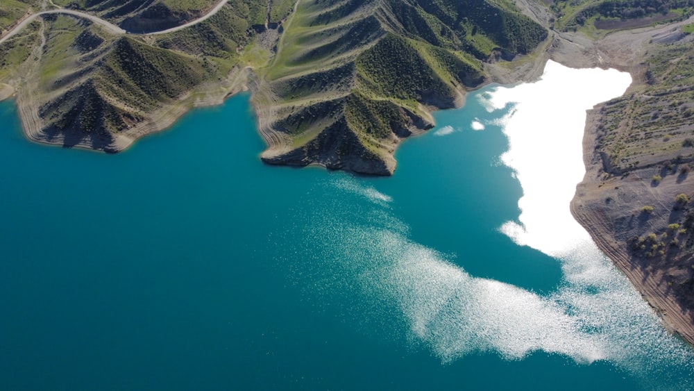 a large body of water surrounded by mountains