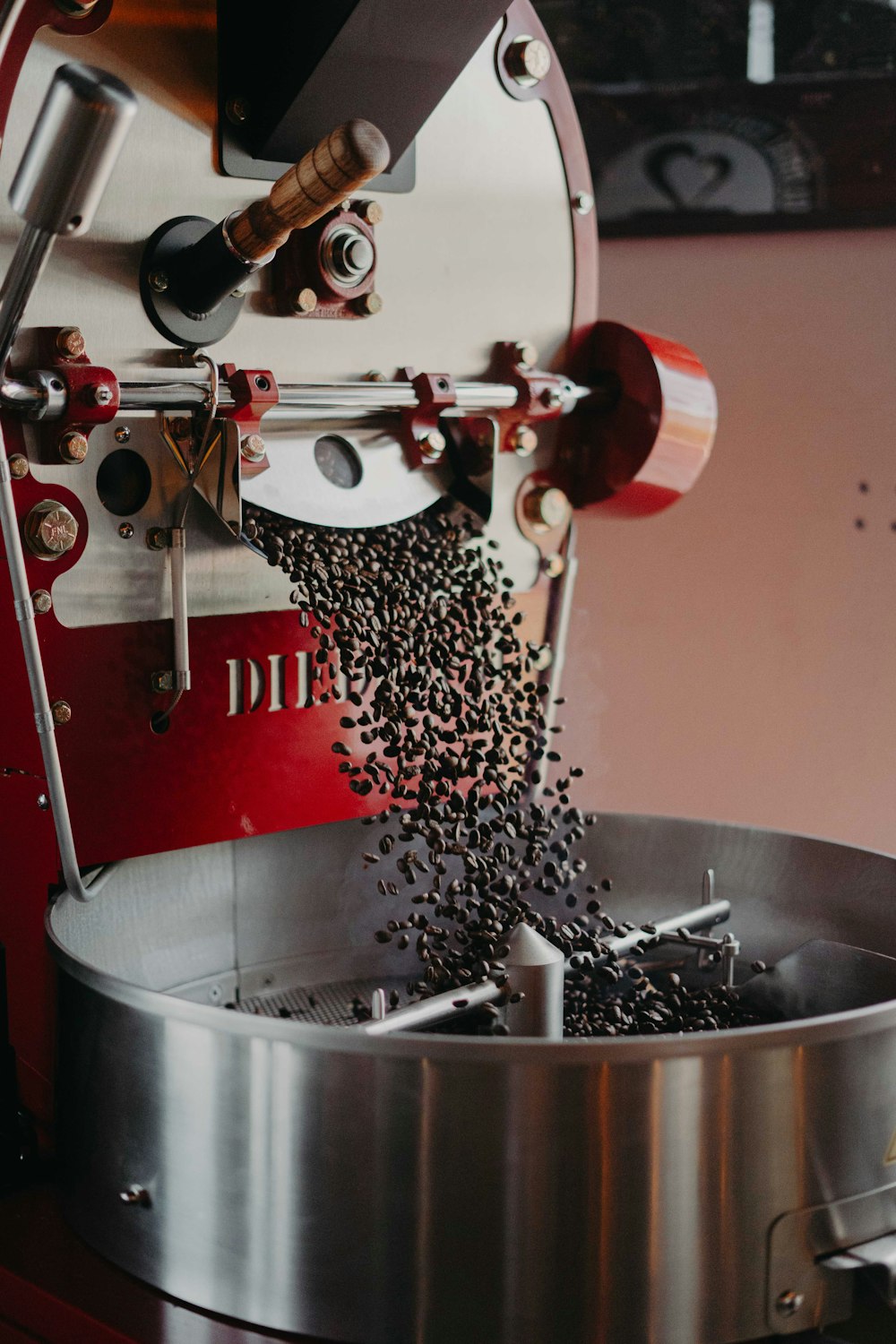 a coffee machine pouring coffee into a pot