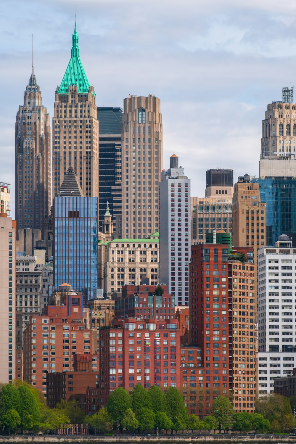 a view of a large city with tall buildings