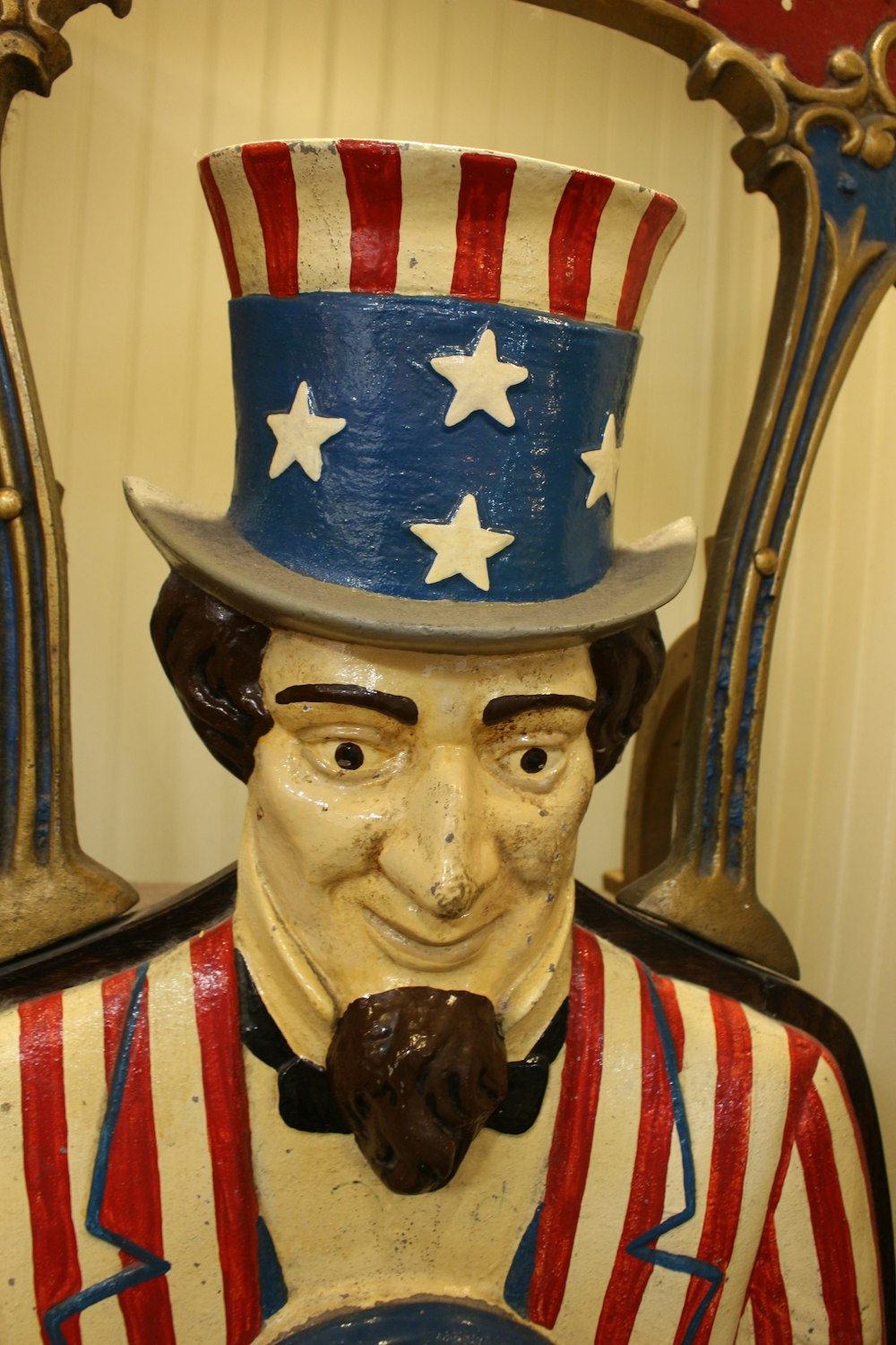 a statue of a man wearing a top hat