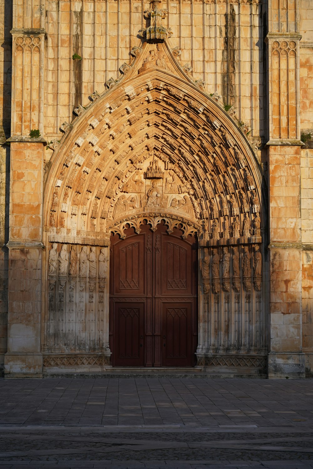 a very large building with a big wooden door