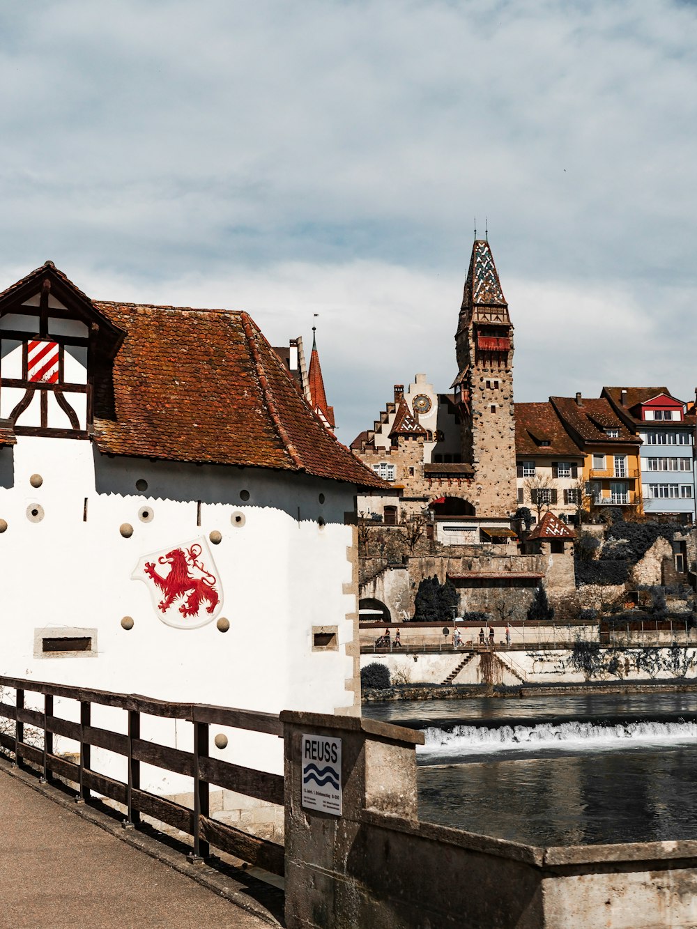 a white building with a red and white flag on it