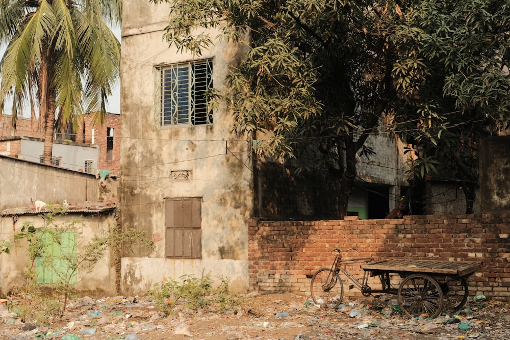 an old building with a wooden bench in front of it