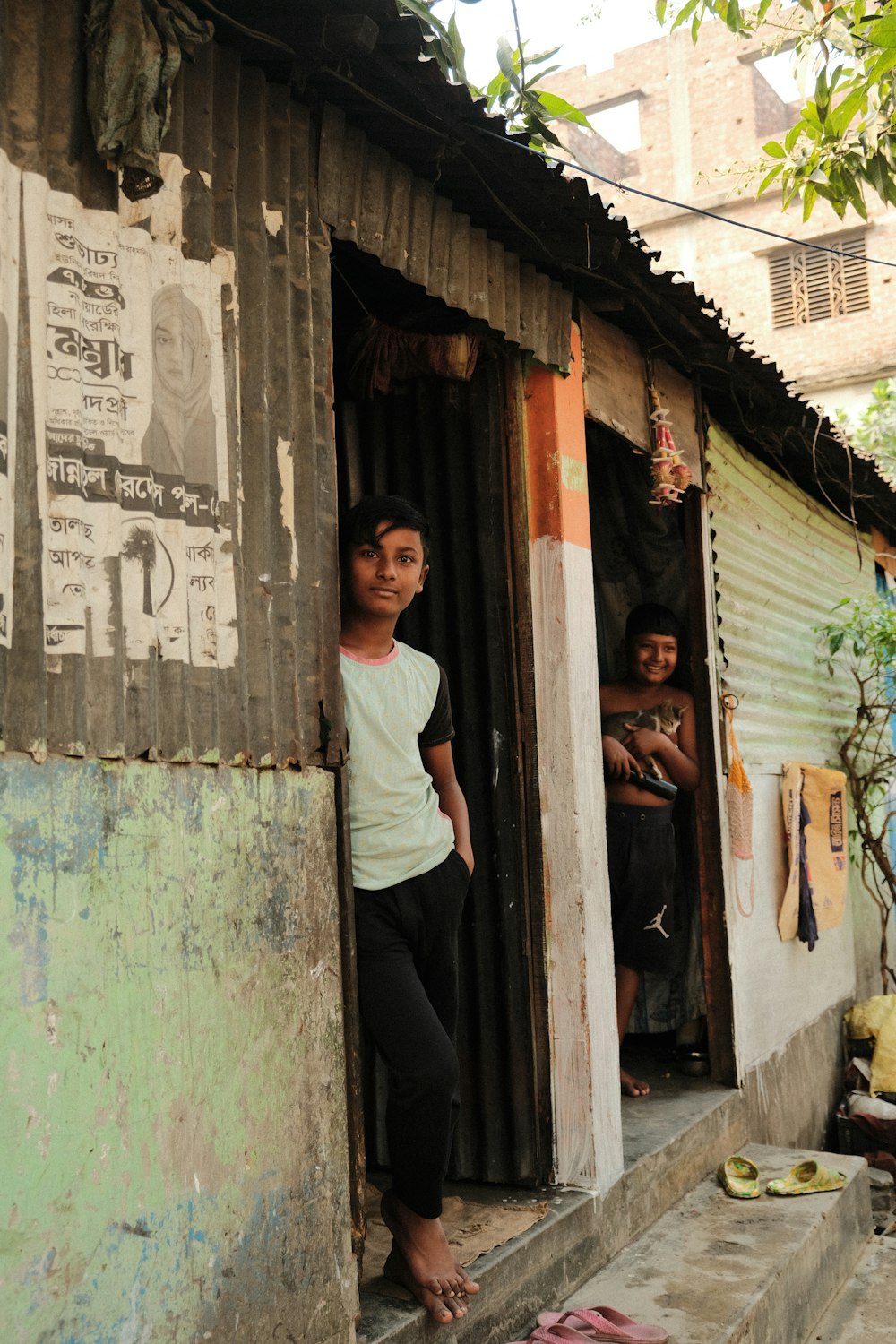 a woman standing in a doorway of a house