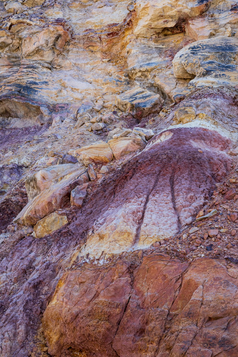 a rock formation with a painted line in the middle of it