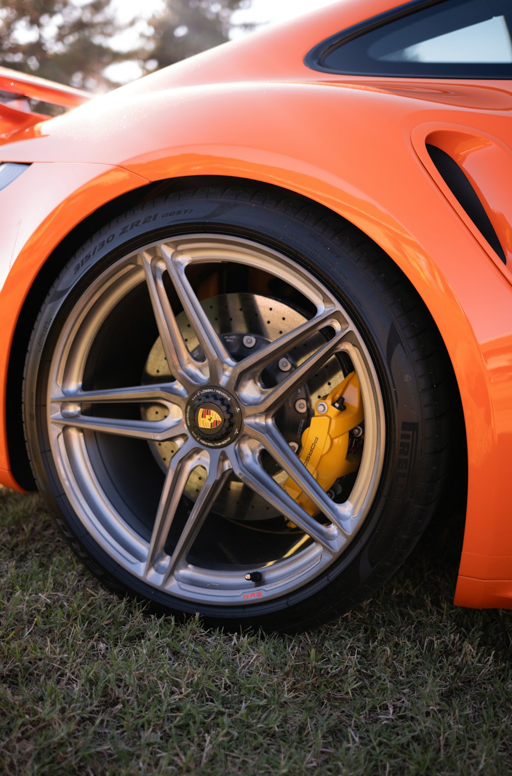 a close up of a sports car tire