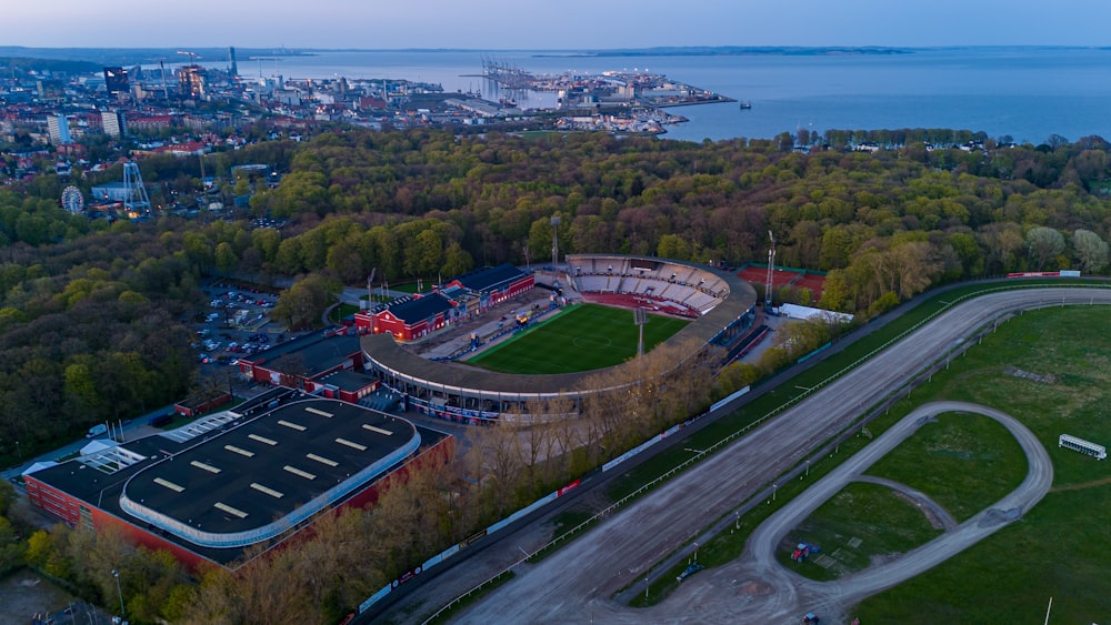 an aerial view of a soccer field in a city