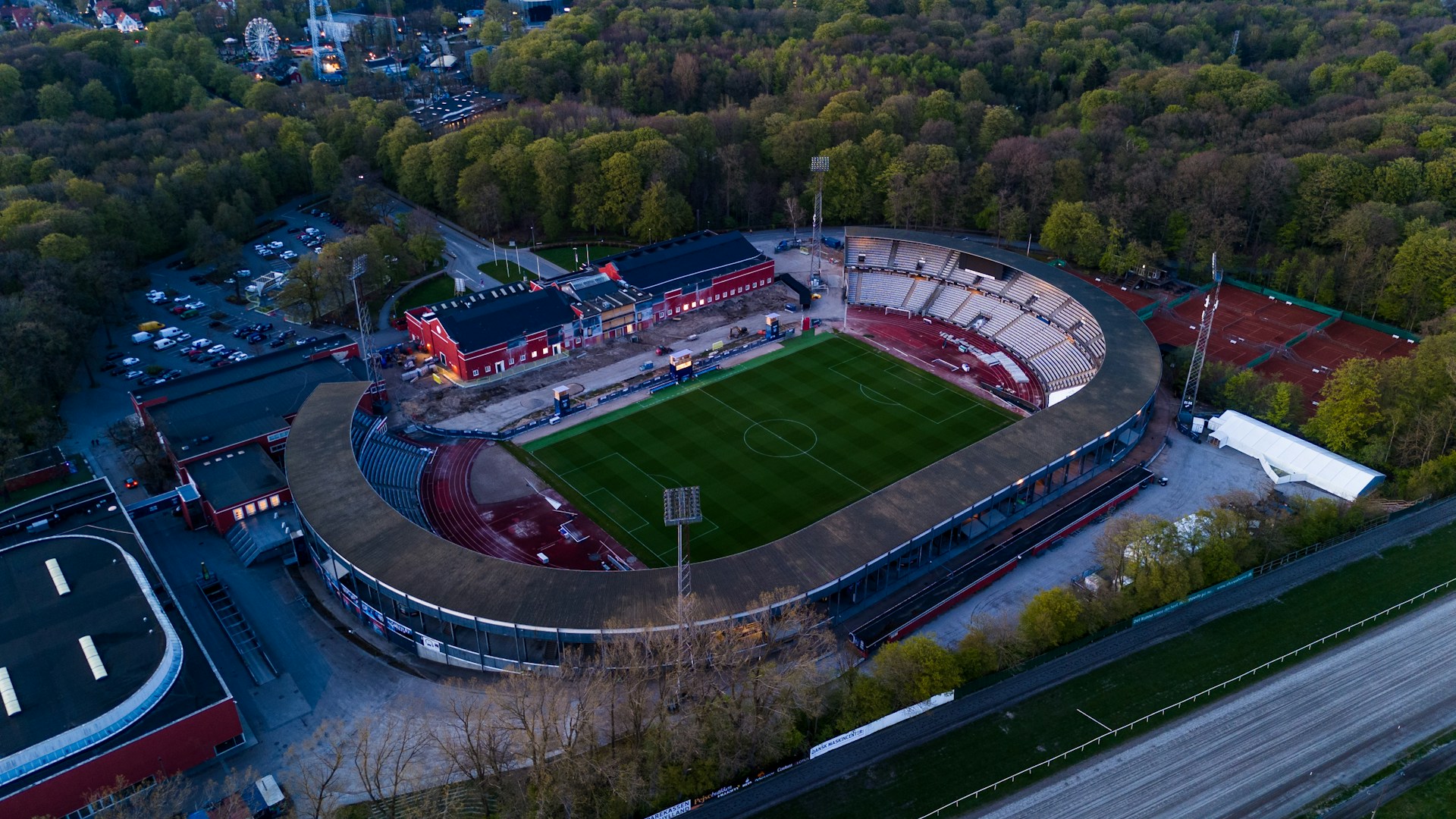 an aerial view of a soccer field in a city