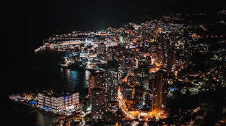 an aerial view of a city at night