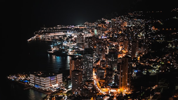an aerial view of a city at night