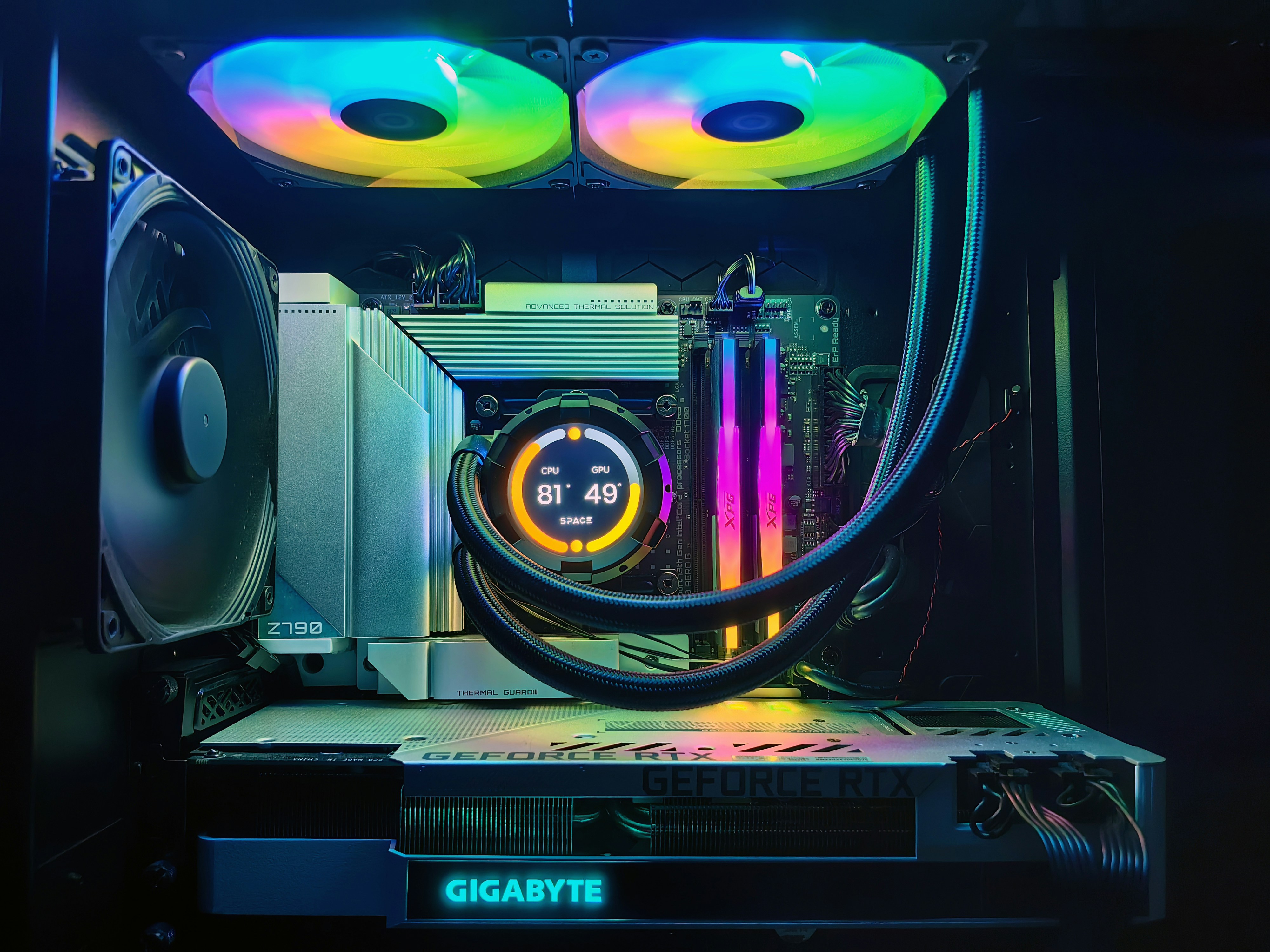Professional gaming PC assembly showing high-performance components and RGB lighting installation