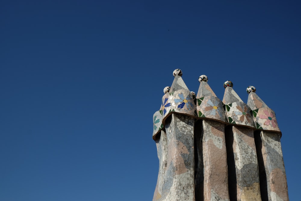 a tall tower with a clock on top of it