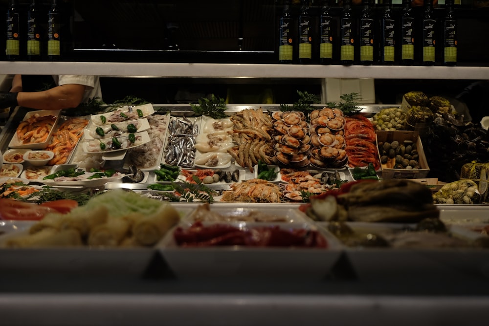 a display case filled with lots of different types of food