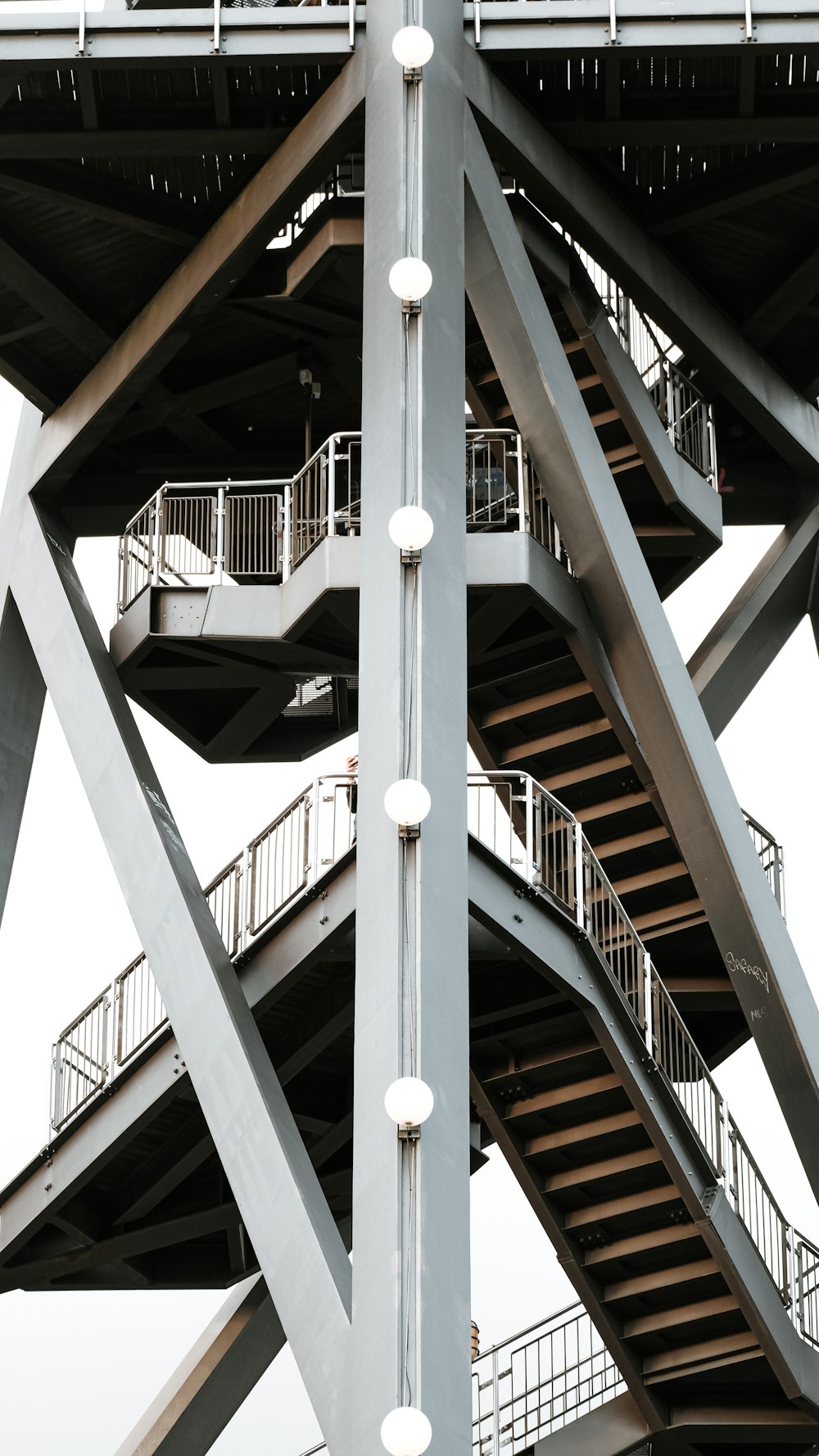 a very tall metal structure with a bunch of stairs