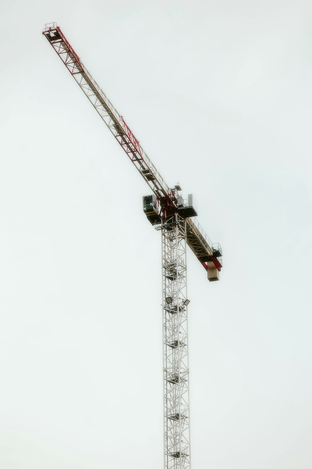 a crane that is sitting on top of a building